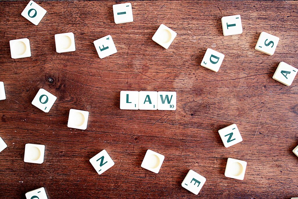 Should You Register Your Business? - Law blocks